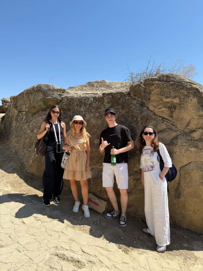 Baku: Gobustan/Absheron guided tour with lunch and tickets - Gobustan’s petroglyphs in a dry open setting