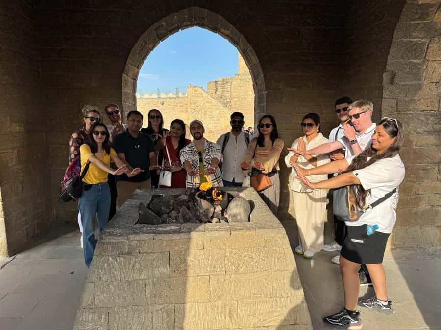 Baku: Gobustan, Mud Volcano, Fire Mount, Temple Lunch Entry - Transport, guides, and the human side of the tour