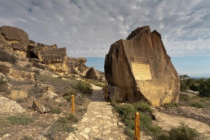 Gobustan, Mud Volcano, Burning Mountain and Fire Temple Tour - Watching the cold mud volcanoes bubble