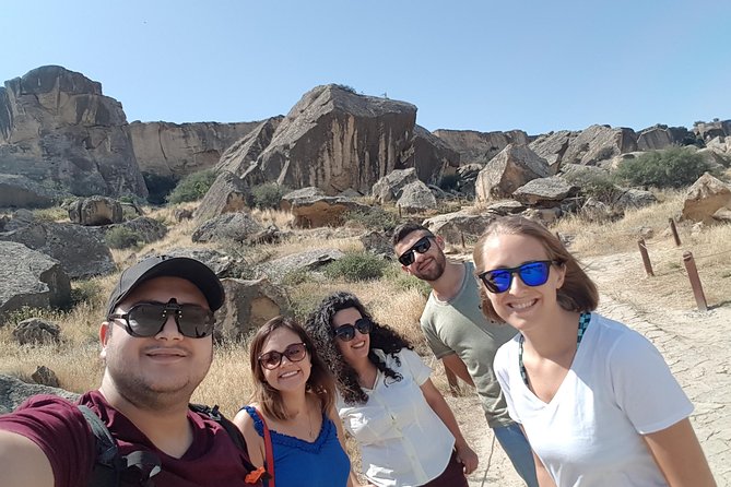 Gobustan Tour and Mad Volcanoes - tour to stone age - Reading the rock engravings outdoors